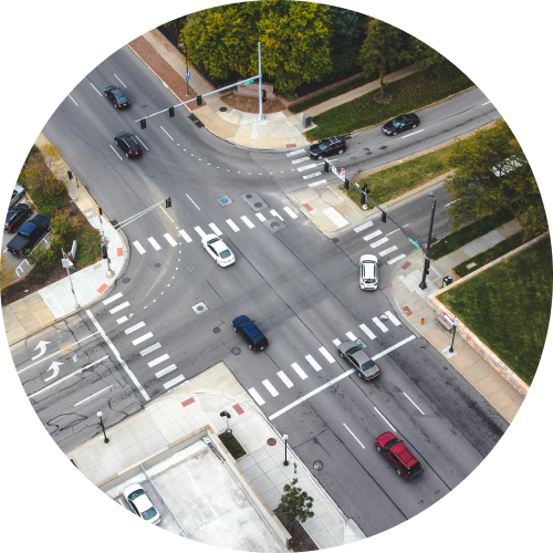 overview of intersection with cars in circle image