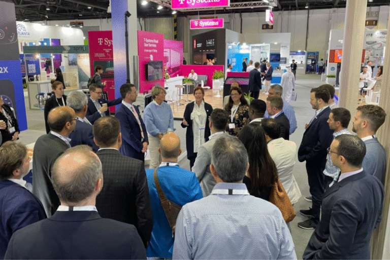 The bustling Miovision booth with many industry leaders engaged in discussion