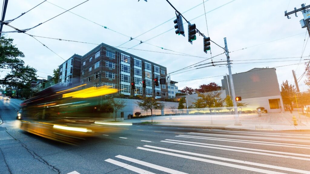 Fast-speed shot of transit in a city setting.