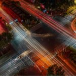 Aerial view of an intersection time-lapse at night